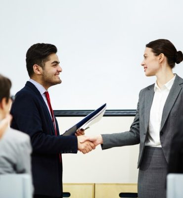 shaking-hand-speaker_1098-14124